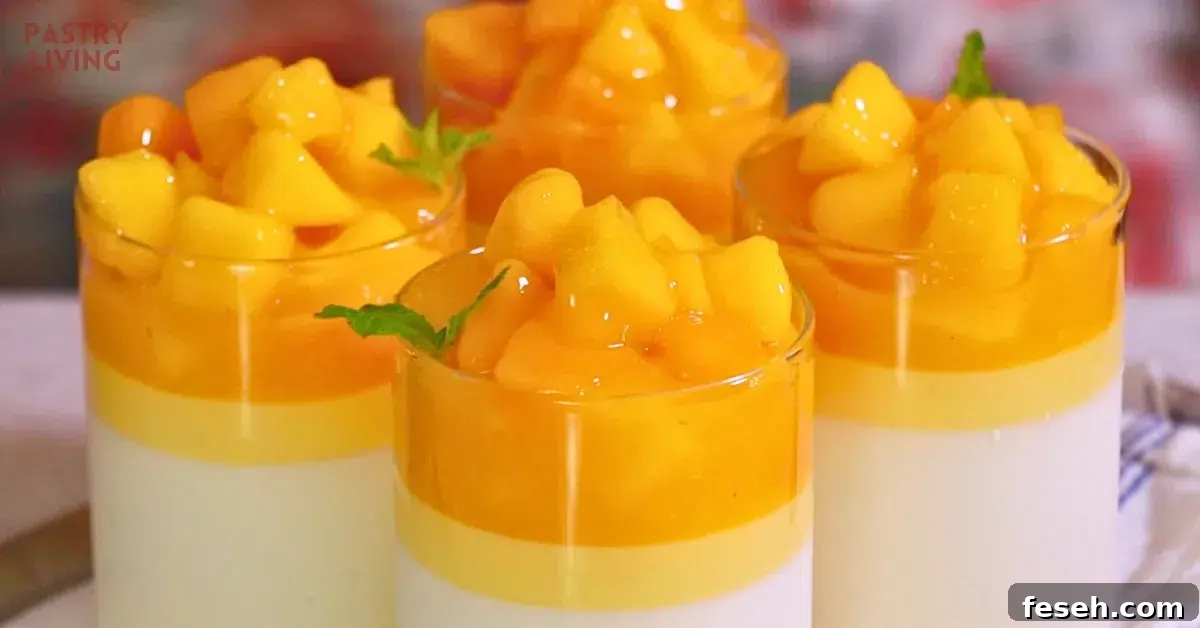 Smooth vanilla and mango panna cotta with melty mango sauce topping in glasses