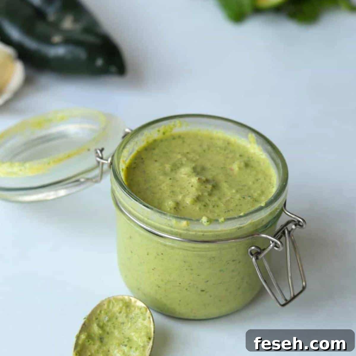 Poblano cream sauce in jar.