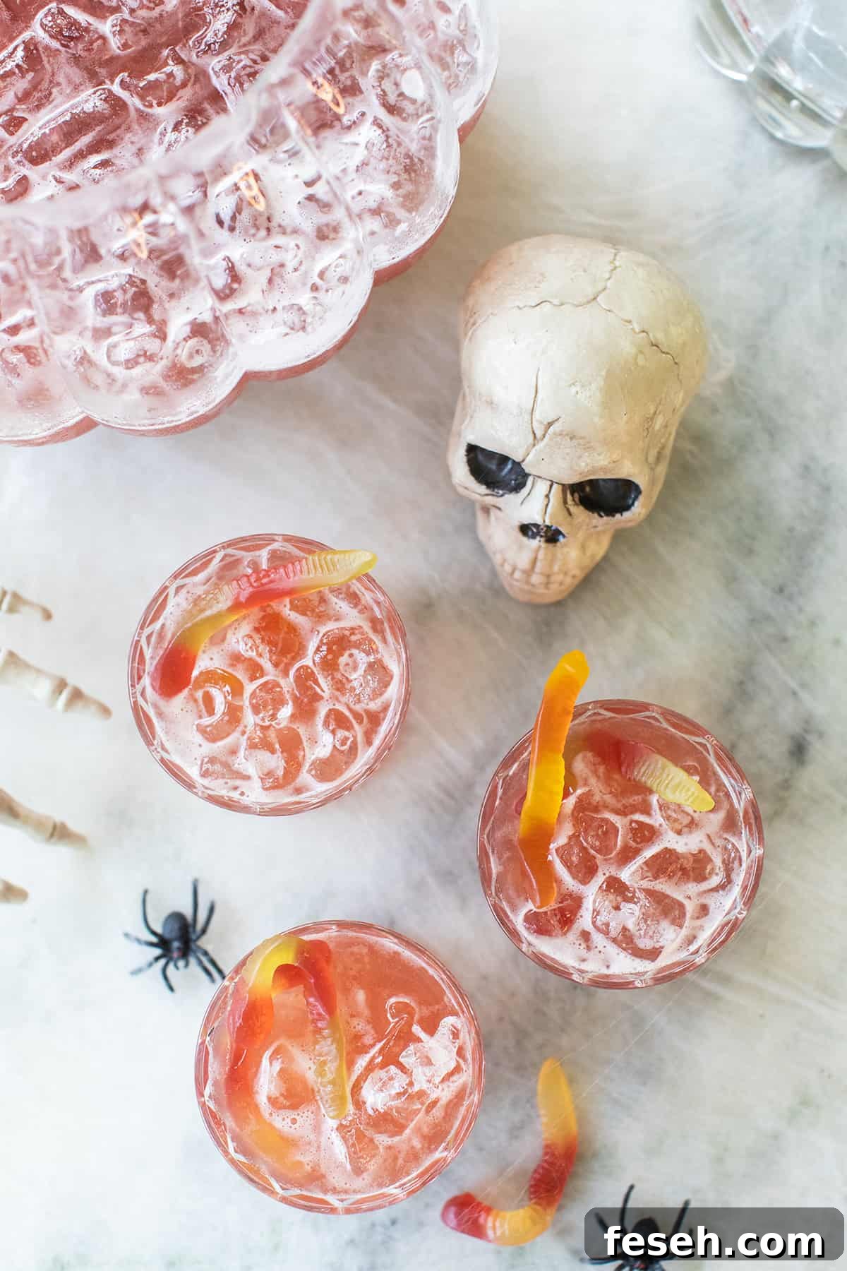 Family-friendly Halloween drink with pineapple juice, cranberry juice, and ginger ale.