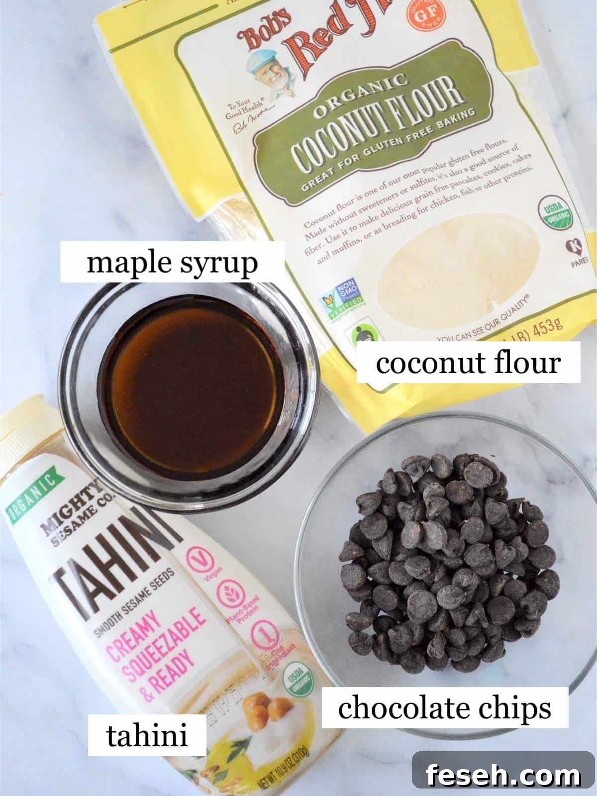 The ingredients in no bake energy bites, laid out and labeled.