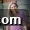 Melissa Erdelac of MamaGourmand headshot in patterned dress.