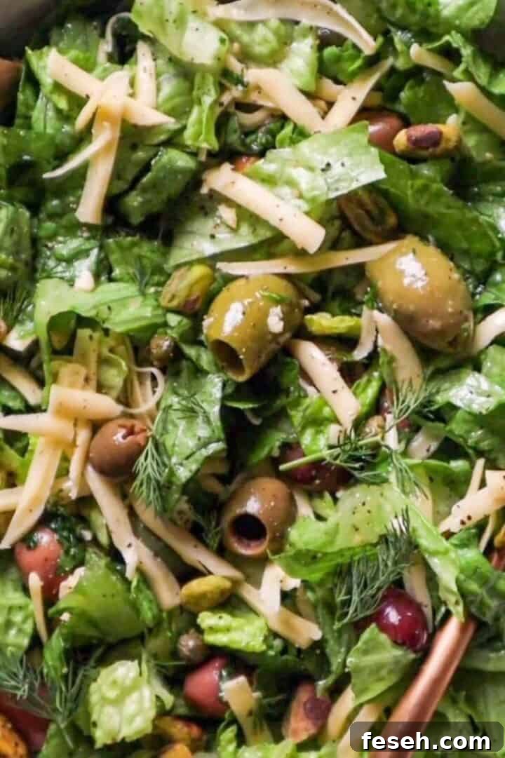green salad with olives and pistachios