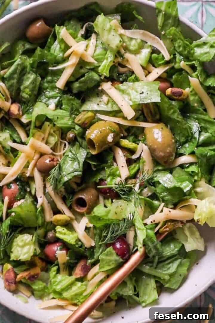 green salad with olives and pistachios