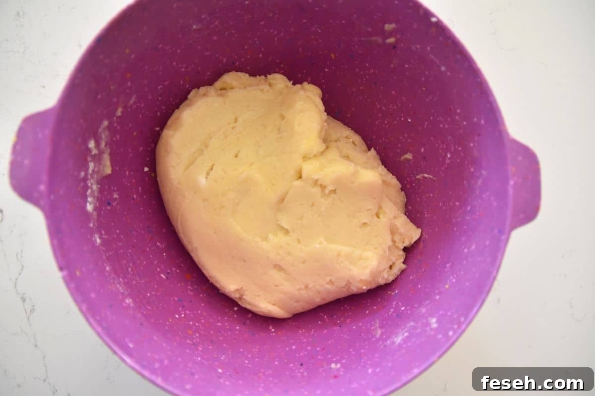 cookie dough in purple bowl