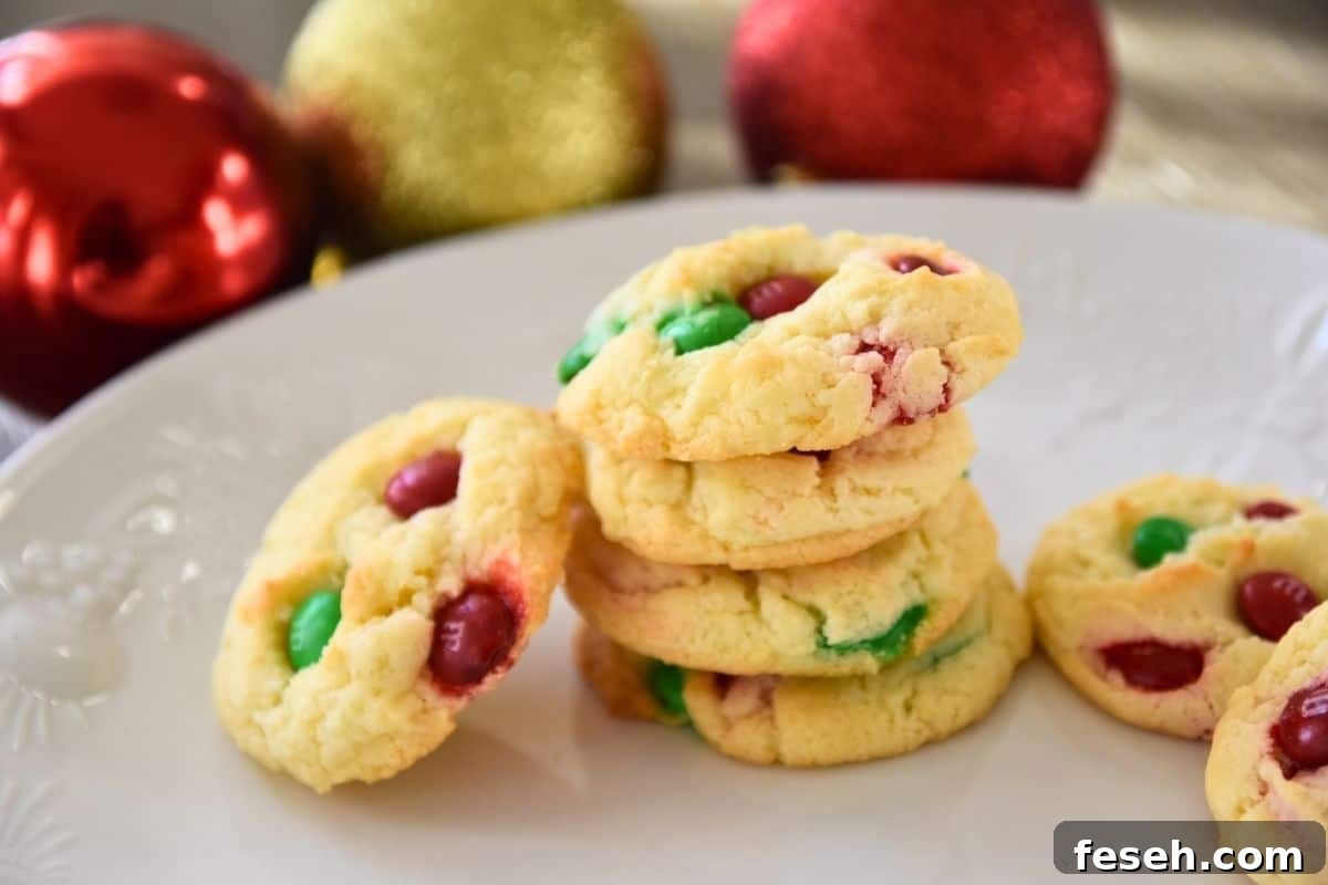 christmas cookies with M&Ms on plate.