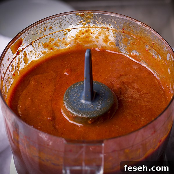 Date BBQ sauce in a food processor.