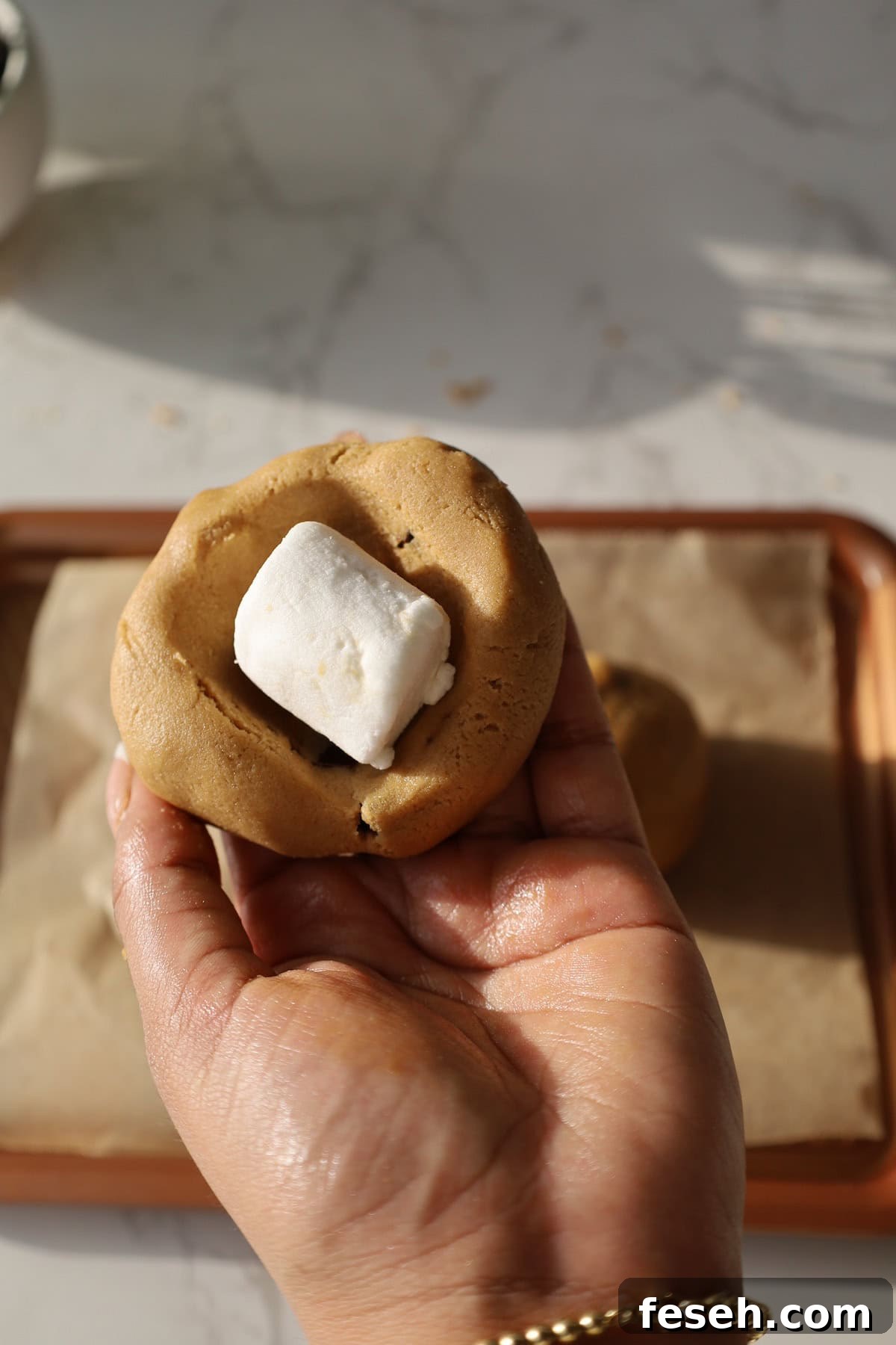 fold in marshmallow into cookie dough