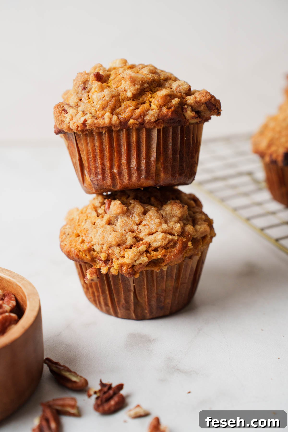 pumpkin banana bread muffins witha. streusel topping.
