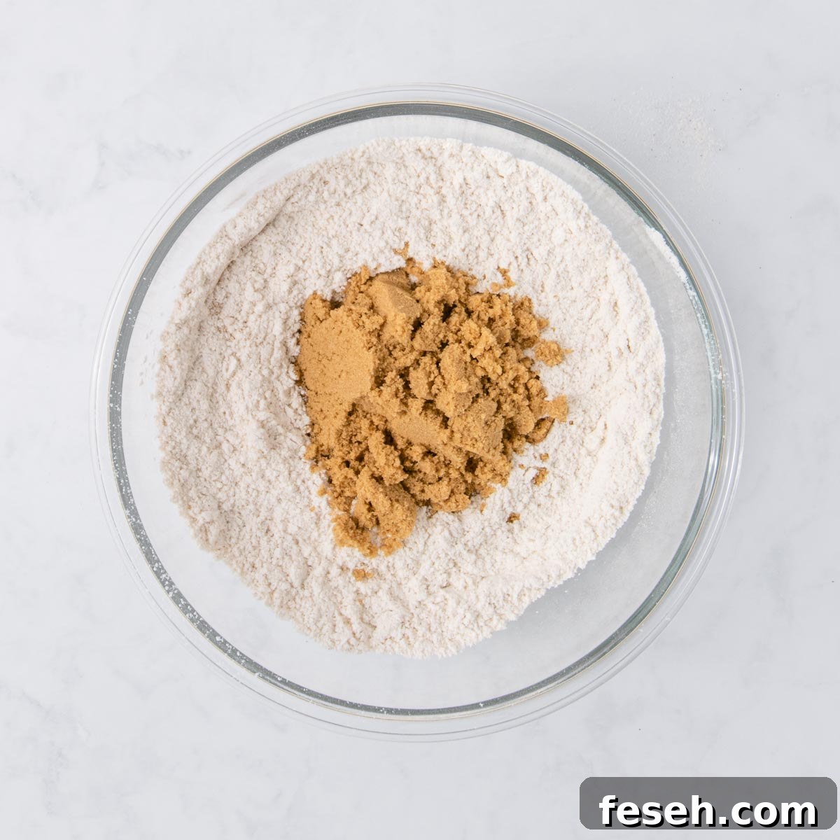The sifted and whisked dry ingredients, with the brown sugar added.