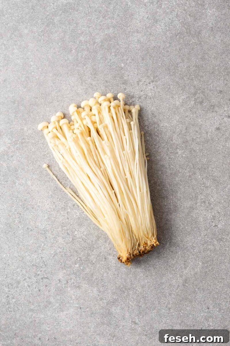 A bunch of fresh enoki mushrooms.