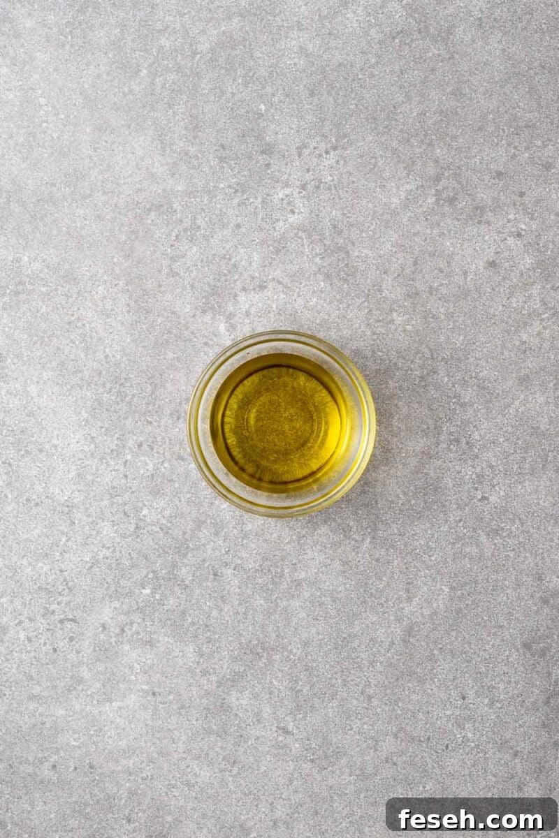 A small bowl with extra virgin olive oil.