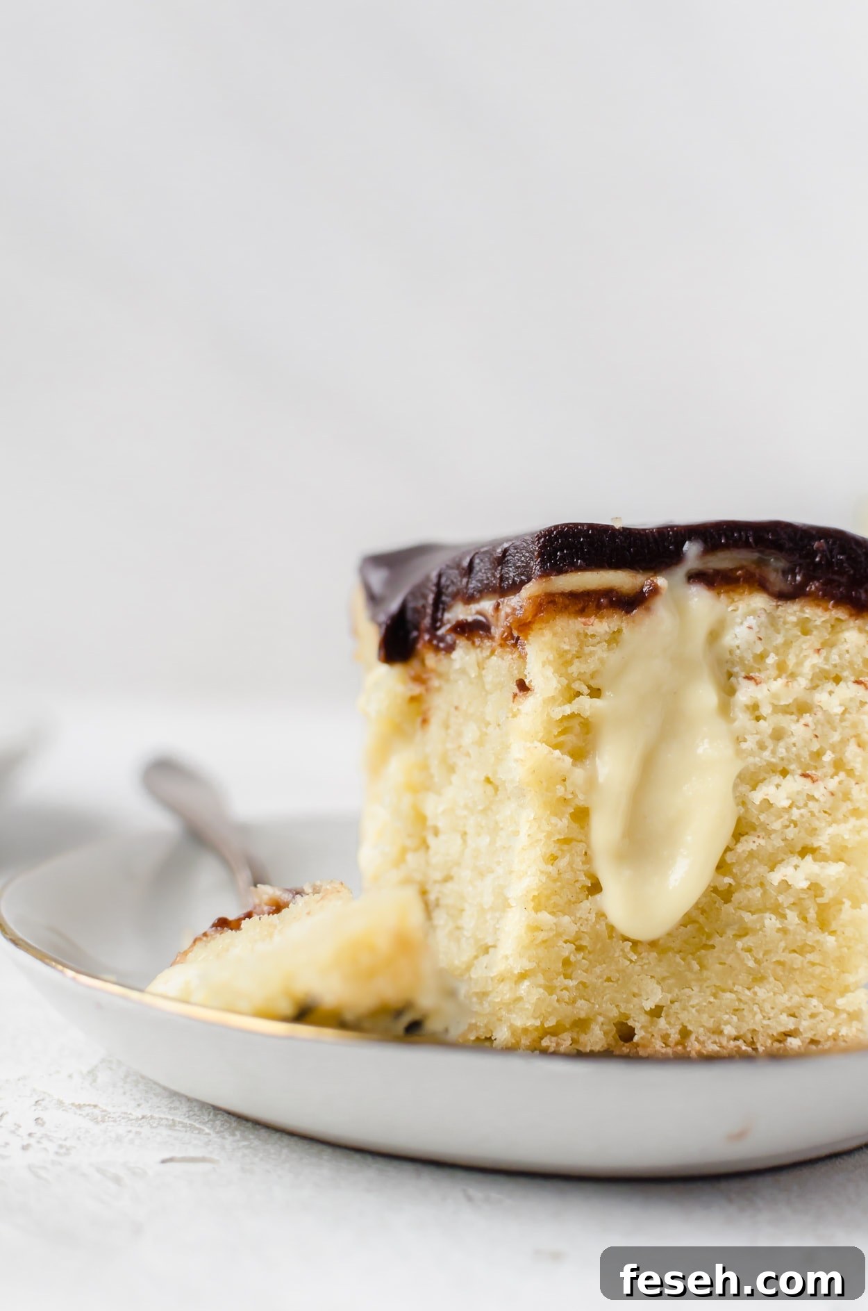 There isn't anything better than a cold glass of milk and boston cream pie poke cake