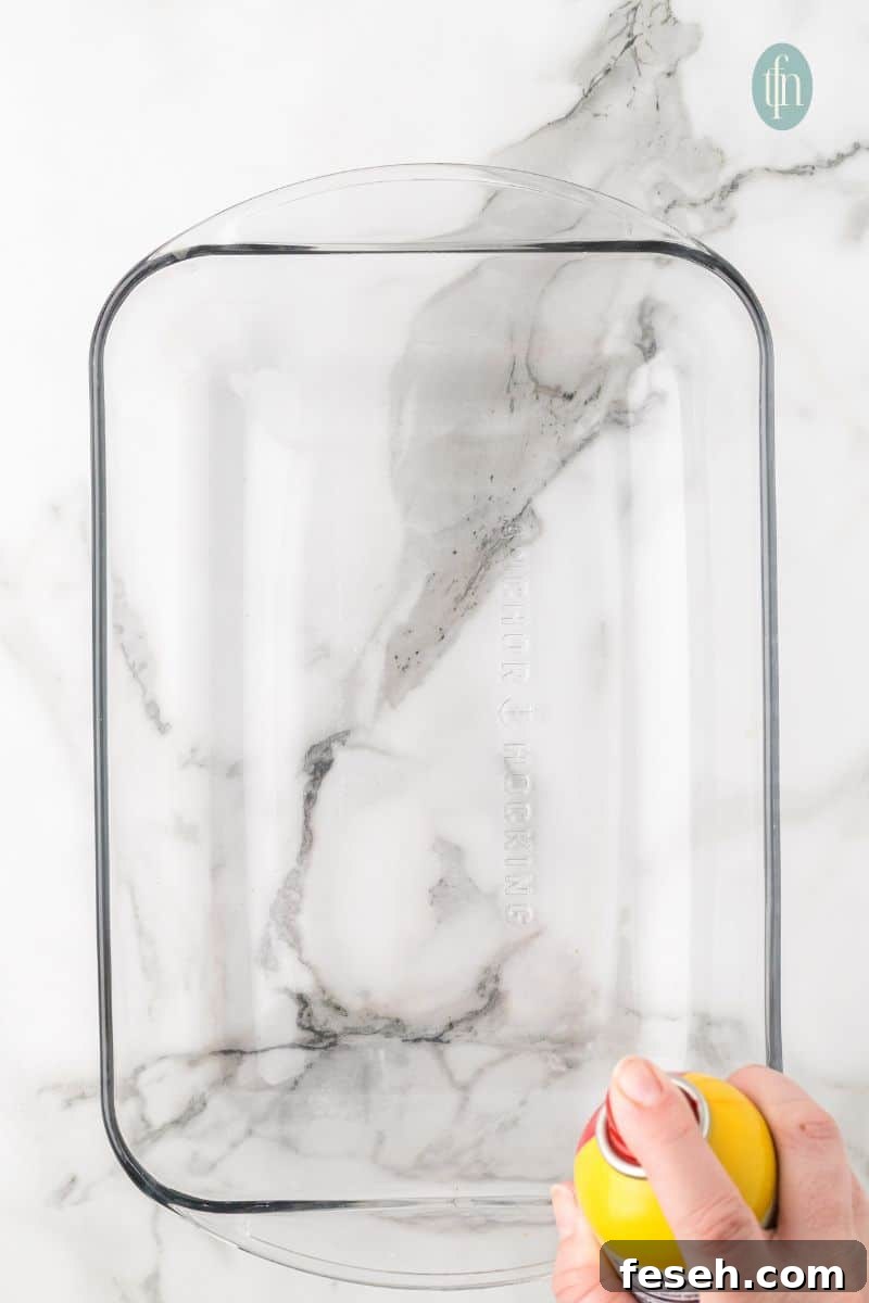 A glass baking pan sprayed with baking oil.