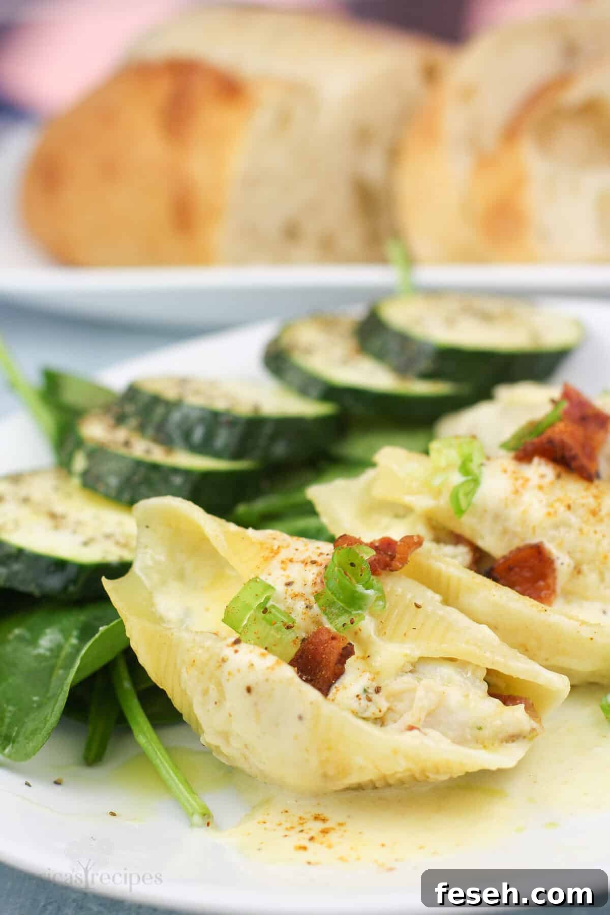 plated portion of shells stuffed with crab with salad