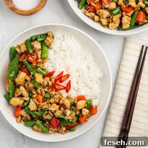 plate of Thai basil tofu pad krapow with rice.