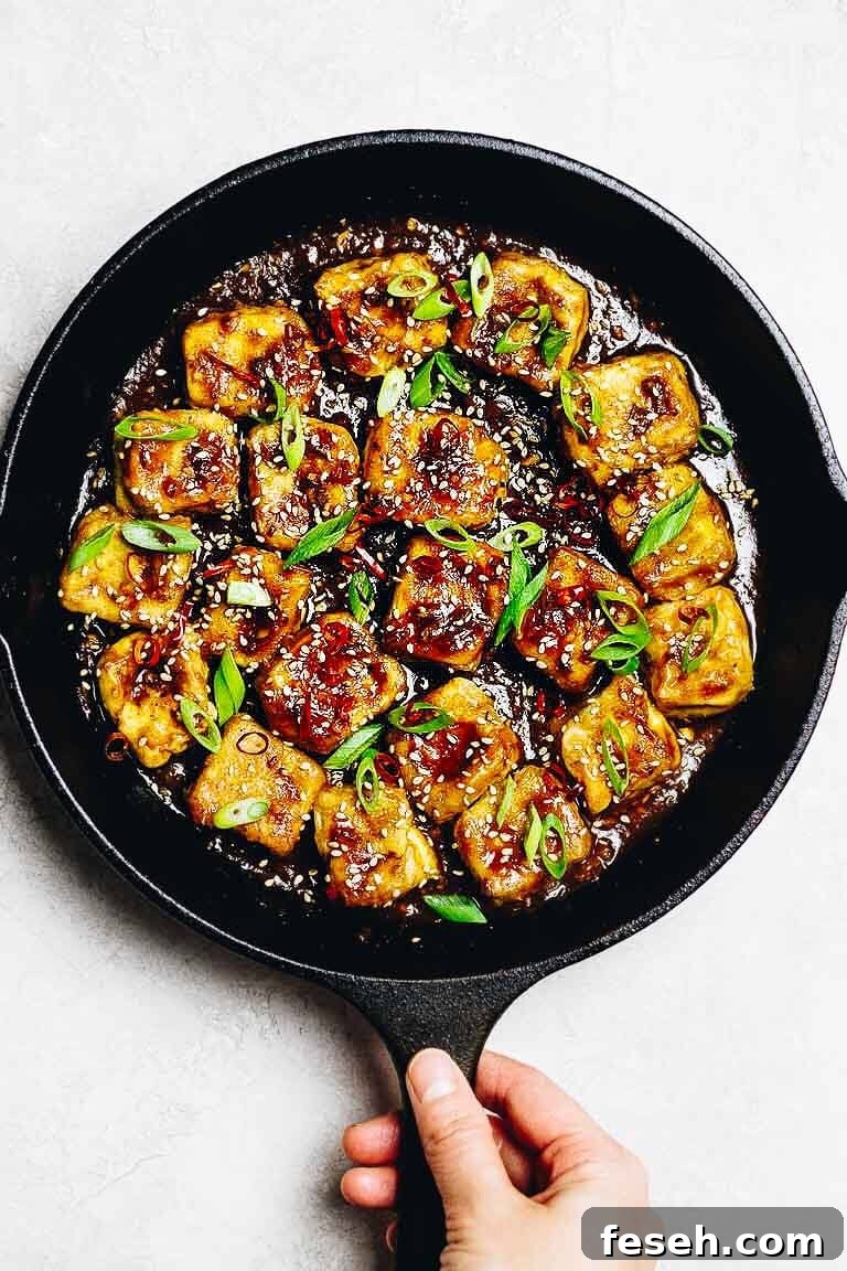 Paleo Crispy Sesame Tofu recipe with oven baked soy free egg custard tofu in Whole30 Sesame Sauce.