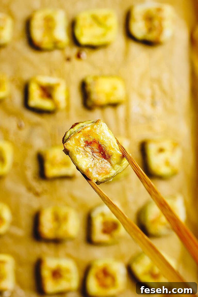 Paleo Crispy Sesame Tofu recipe with oven baked soy free egg custard tofu in Whole30 Sesame Sauce.
