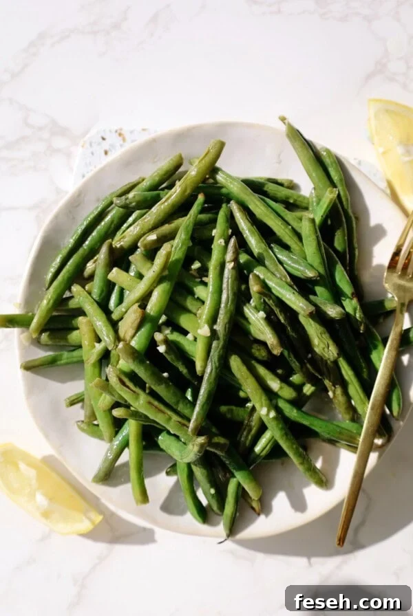 Spicy Honey Mozzarella Sticks Recipe (Video Included) 11 air fryer green beans featured image