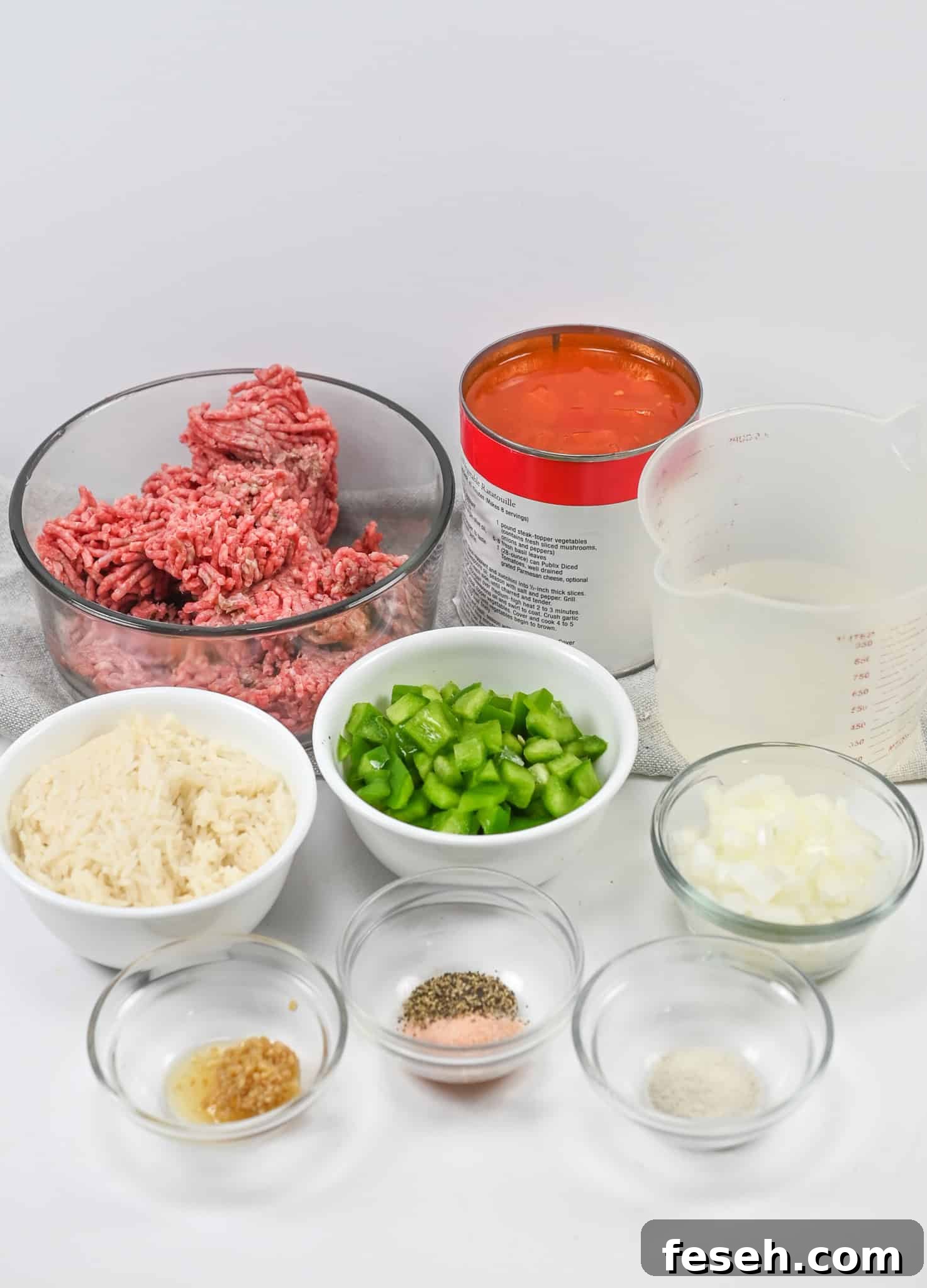 The ingredients laid out on a white surface for Unstuffed Pepper Soup.