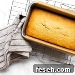 Gluten free banana bread in pan on cooling rack