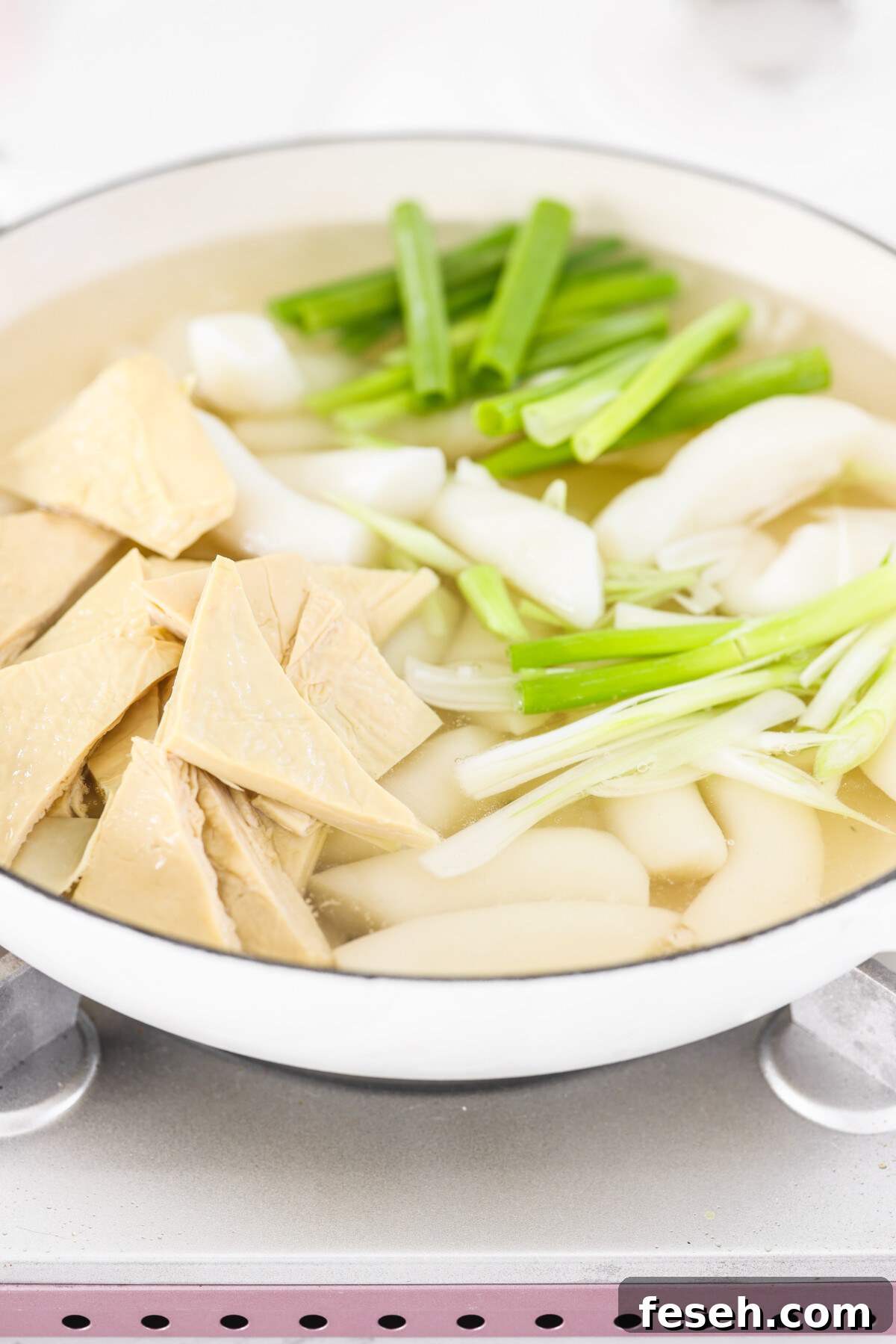 a bowl of Korean rice cakes before the gochujang is mixed in