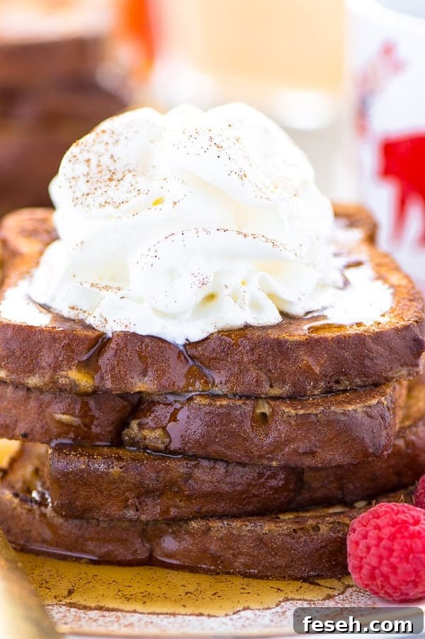 This Gluten Free Eggnog French Toast is the perfect breakfast during the holiday season. You can make it ahead too and reheat it for your holiday brunch! For dairy free, use non-dairy eggnog. Recipe from @whattheforkblog | whattheforkfoodblog.com | recipes for Christmas brunch | gluten free breakfast recipes | easy French toast recipes | #Christmas #frenchtoast #breakfast #glutenfree #easyrecipes #recipe #eggnog #brunch