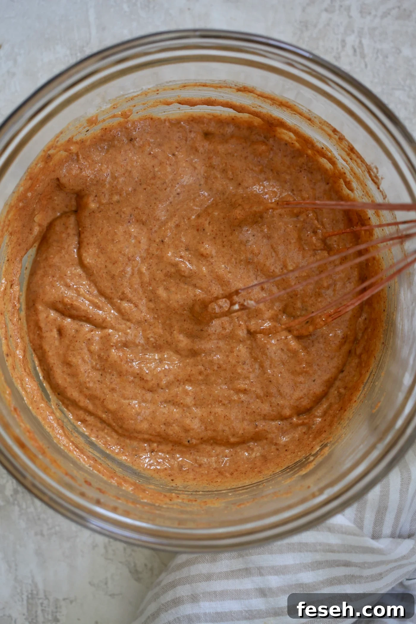 mixing bowl with pumpkin batter