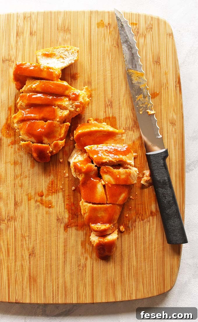 Buffalo Chicken Salad with Greek Yogurt Ranch Dressing - satisfies the craving for buffalo chicken wings only with more veggies. It's packed with crunch, spicy buffalo sauce, and homemade cooling Greek yogurt ranch dressing. So tasty! #Glutenfree #buffalochicken #recipes #salad #healthyfood | robustrecipes.com