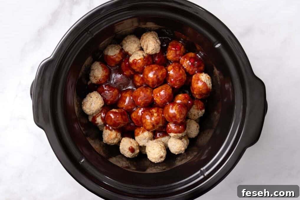 grape jelly meatballs with sauce.