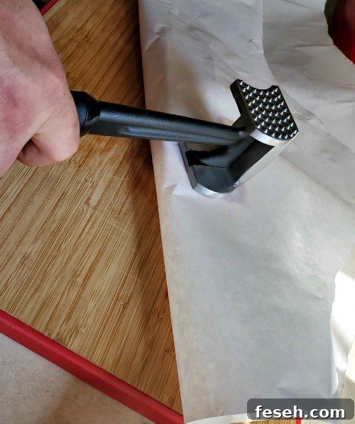 Meat Tenderizing pounding steak for steak fajitas