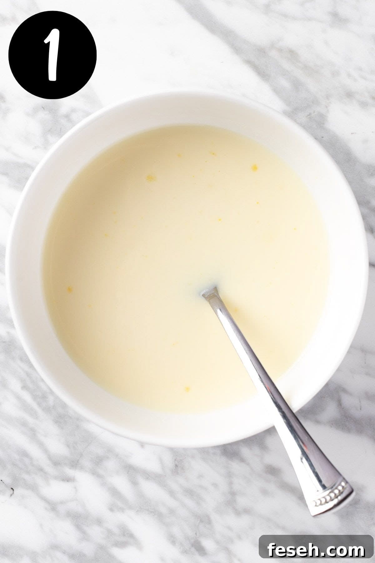 Mix the vanilla pudding, milk and vodka together.