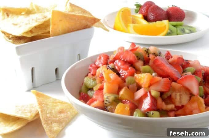 Summer Fruit Salsa with Cinnamon Butter Tortilla Chips 2 A bowl of fruit salsa with chips