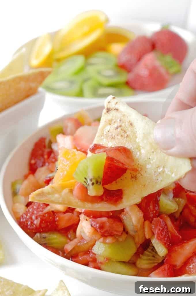 Summer Fruit Salsa with Cinnamon Butter Tortilla Chips 6 A scoop of salsa on a chip