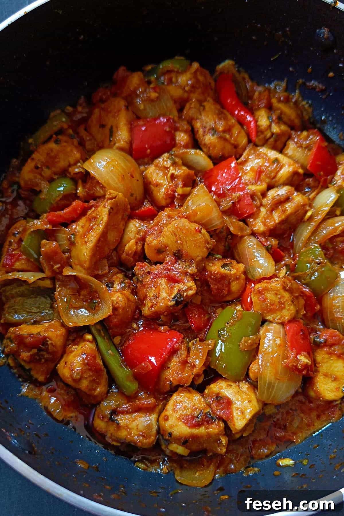 Image showing chicken jalfrezi in a nonstick pot.