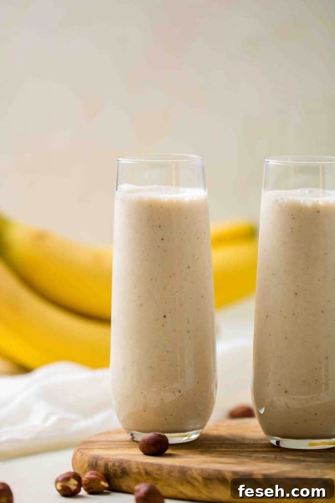 3-Ingredient Toasted Hazelnut Banana Smoothie 6 banana hazelnut smoothie with cacao nibs on top