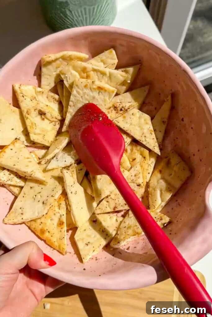 Pita bread triangles tossed with seasoning.