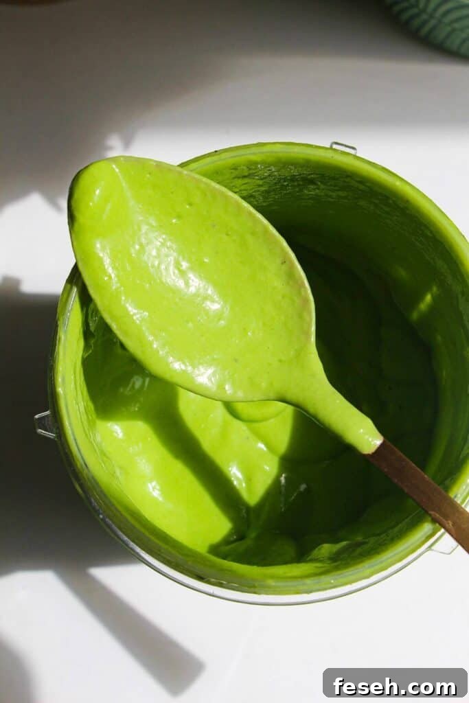 Green Caesar sauce in blender.