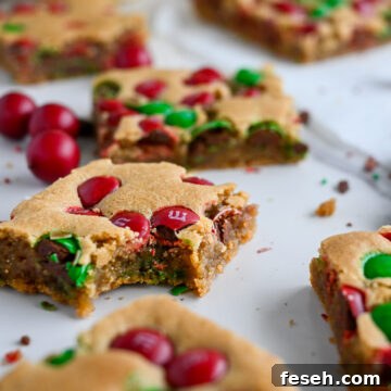 Christmas cookie bars on parchment paper.