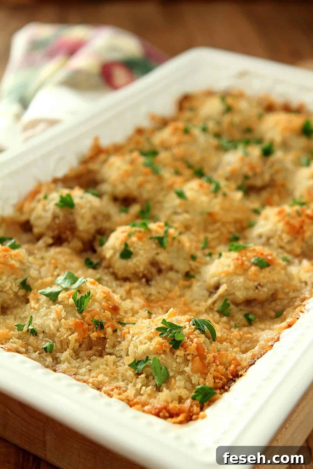 Casserole dish with Baked Mushrooms in a Parmesan Cream Sauce topped with panko crumbs.