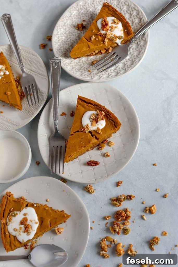 pumpkin pie slices on plate with forks 