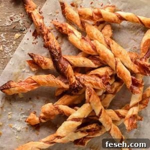pile of puff pastry twists with prosciutto and parmesan