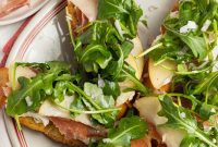 Crispy Crostini Topped with Burrata and Prosciutto