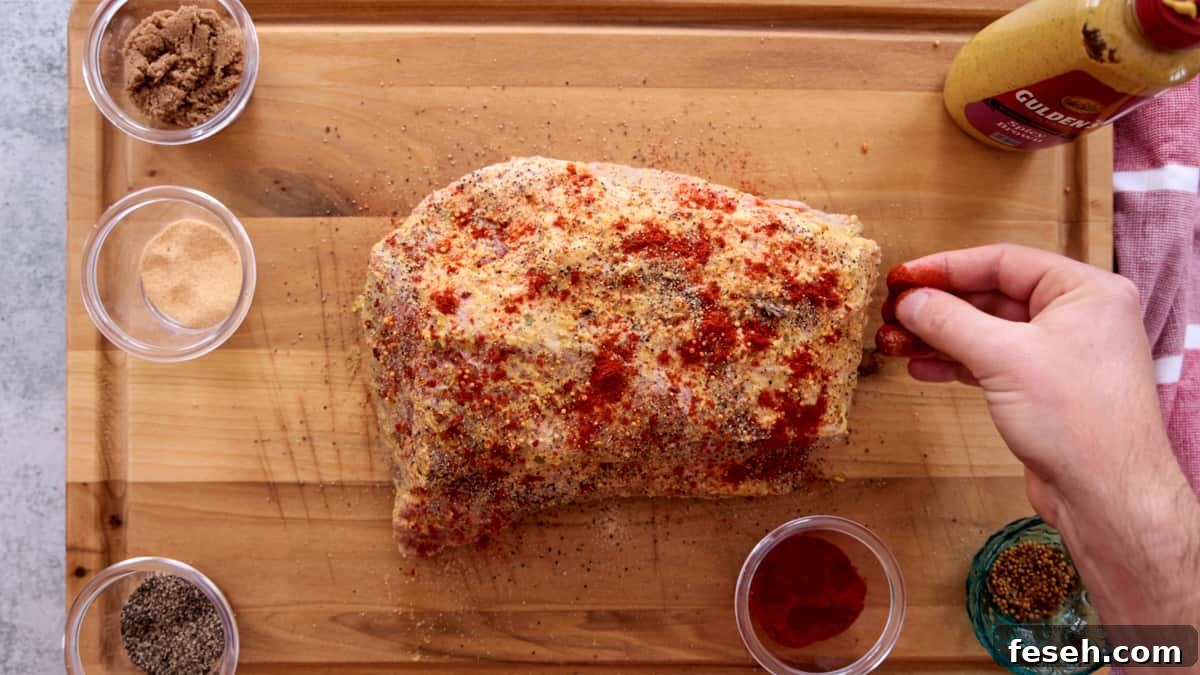 Smoked Corned Beef Recipe for Tender, Flavorful Brisket 6 Seasoning corned beef brisket on cutting board.