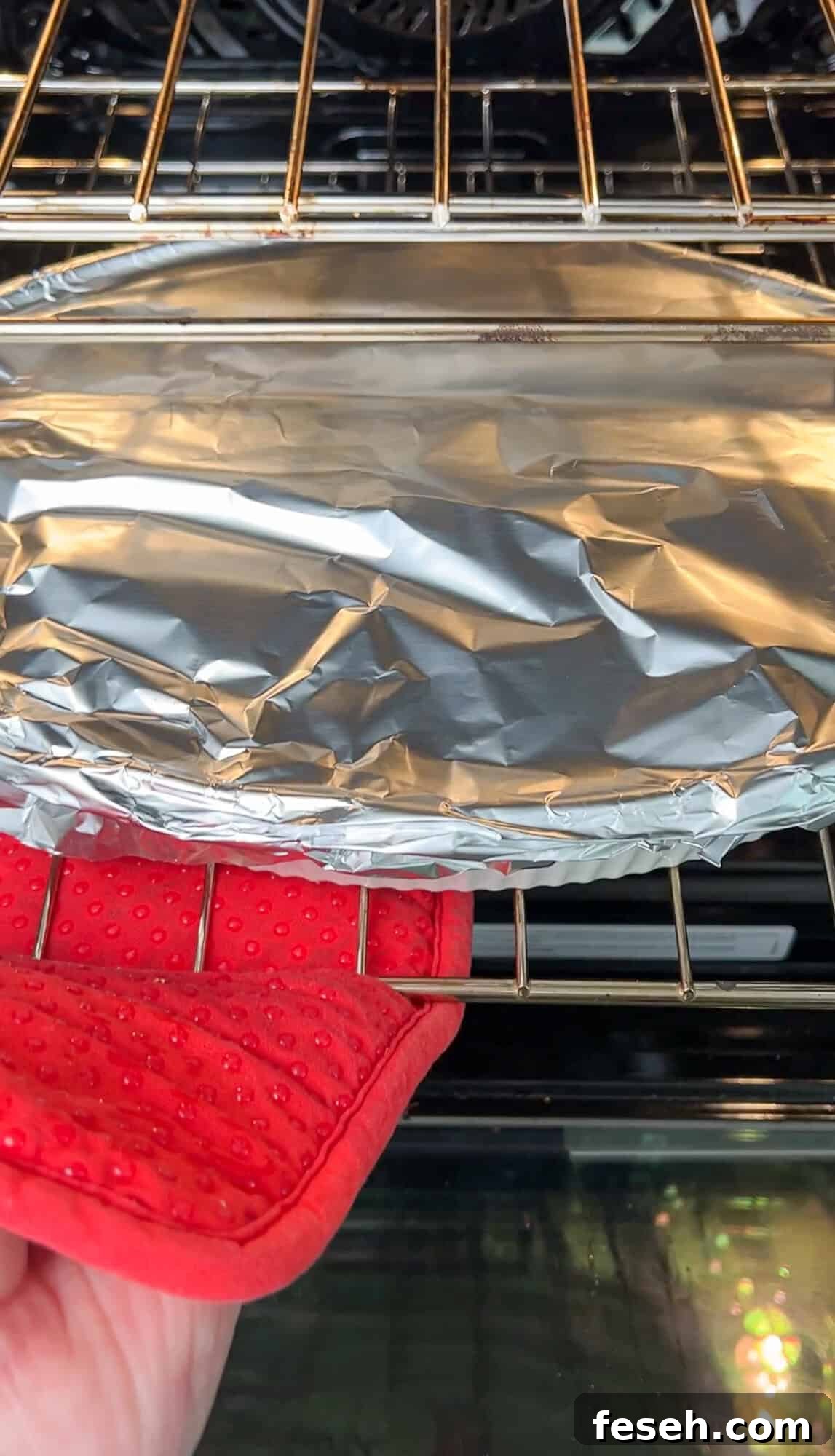Greek-Style Chicken Tzatziki Casserole 12 chicken tzatziki casserole covered with foil going in oven
