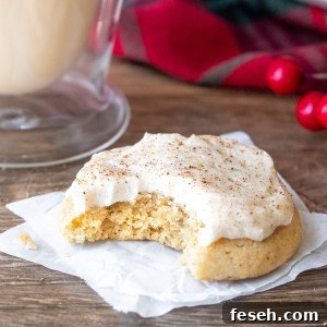 Holiday Eggnog Cookies with Creamy Eggnog Frosting 5 Eggnog cookie with eggnog buttercream with a bite taken out