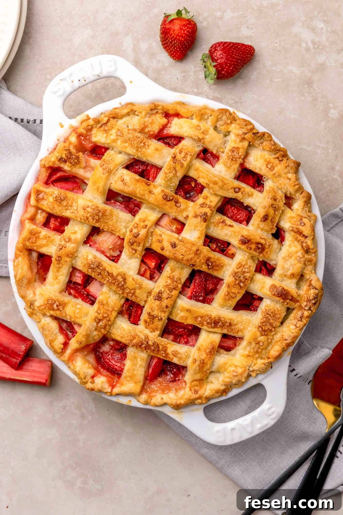 Strawberry Rhubarb Pie Recipe with Buttery Crust 2 A Strawberry Rhubarb Pie in a white baking dish