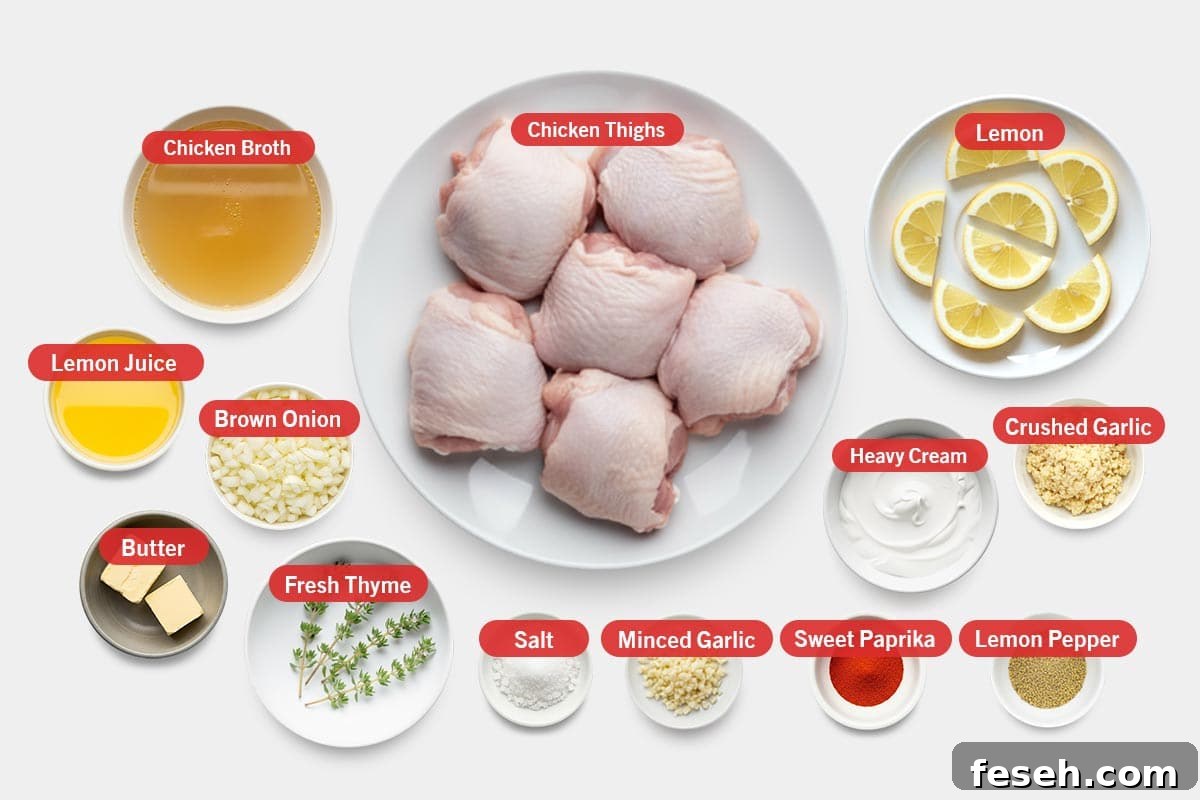 Creamy Lemon Garlic Chicken Recipe 3 Top shot of ingredients: Chicken broth, chicken thighs, lemon, lemon juice, brown onion, butter, fresh thyme, salt, minced garlic, sweet paprika, lemon pepper, heavy cream, and crushed garlic.