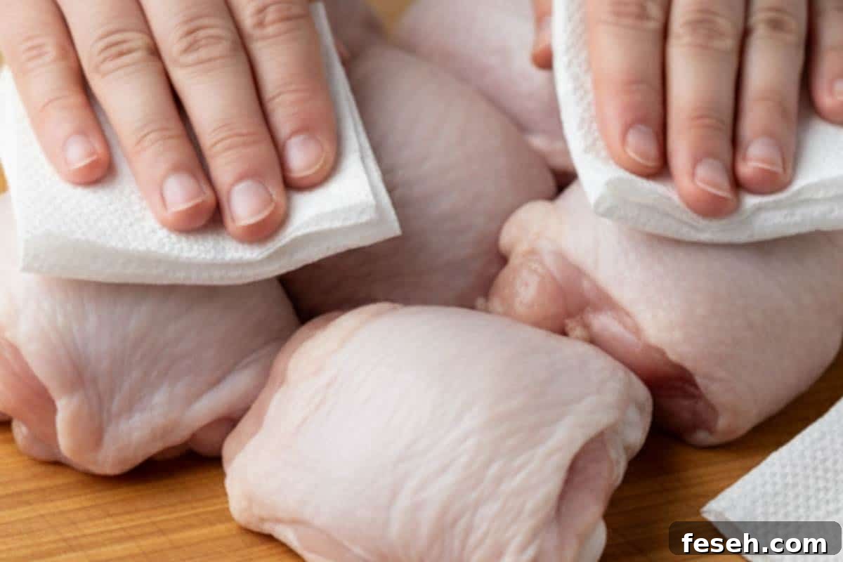 Creamy Lemon Garlic Chicken Recipe 4 Patting the chickens dry using paper towel.