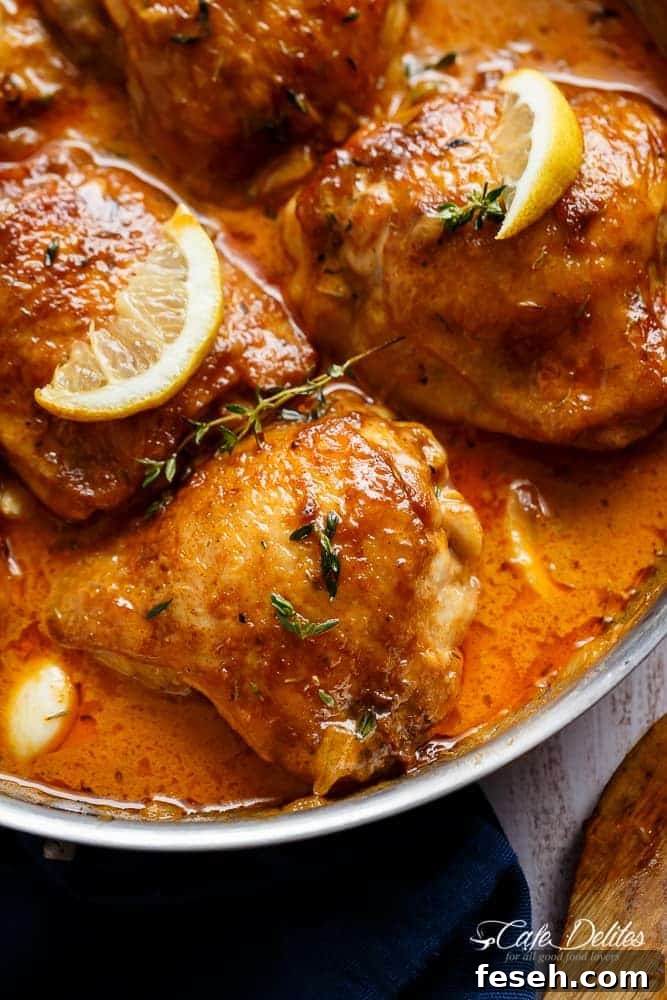 Creamy Lemon Garlic Chicken Recipe 10 Image focusing over a chicken piece of Creamy Lemon Garlic Chicken