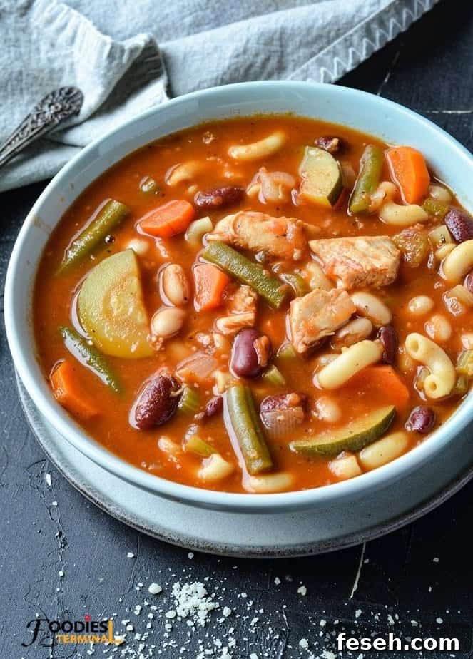Hearty Chicken Minestrone Soup with Vegetables 2 chicken minestrone soup in a light blue bowl